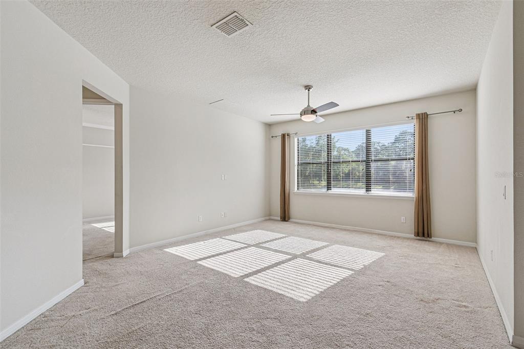 7137 Beek Street Windermere, FL 34786 - Photo 15 of 33 a view of an empty room with a window