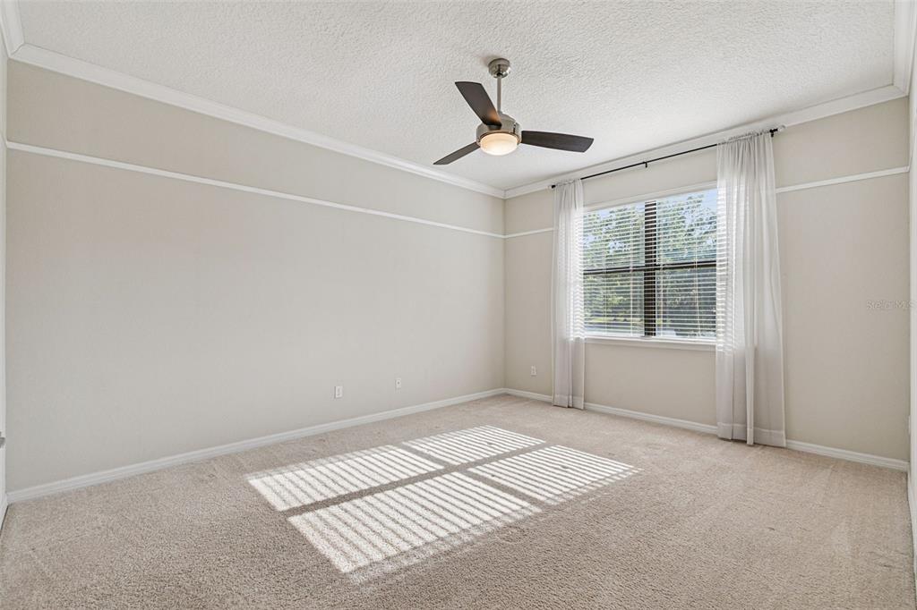 7137 Beek Street Windermere, FL 34786 - Photo 18 of 33 a view of an empty room with a window