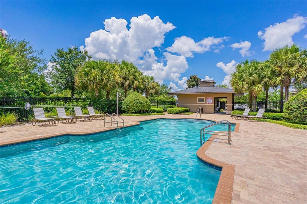 7137 Beek Street Windermere, FL 34786 - Photo 26 of 33 a view of a house with swimming pool