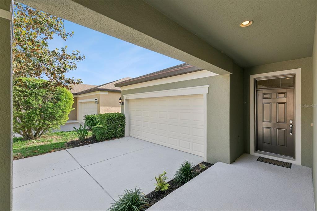 7137 Beek Street Windermere, FL 34786 - Photo 27 of 33 front view of a house with a yard