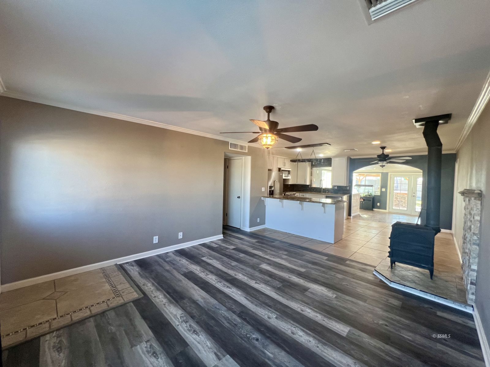 333 Traci Lane Ridgecrest, CA 93555 - Photo 4 of 30 a view of a kitchen with kitchen island wooden floor and stainless steel appliances