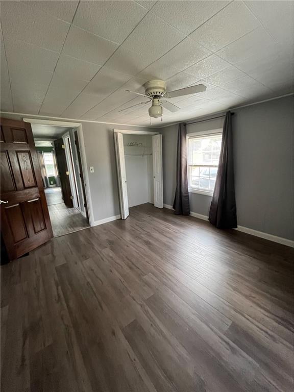 2107 Butler Logan Road Tarentum, PA 15084 - Photo 8 of 19 an empty room with wooden floor and windows