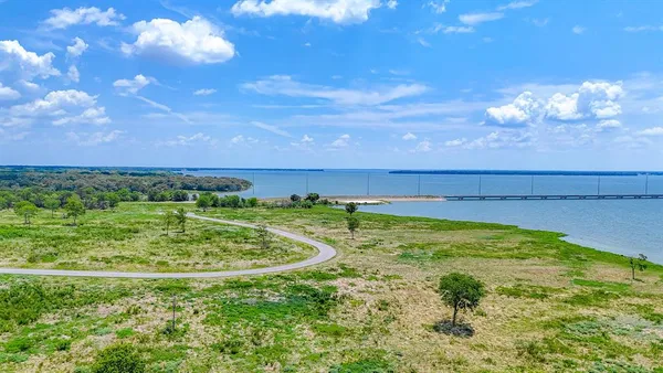 a view of a yard with an outdoor space