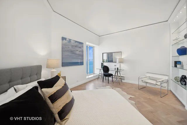 a living room with furniture a couch and a table