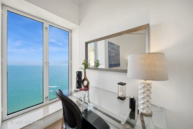 a bathroom with a sink and mirror