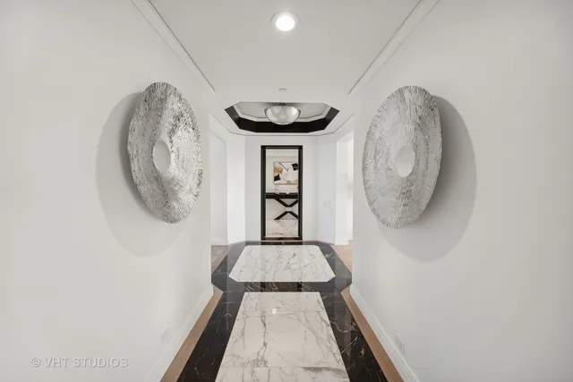 a picture of a hallway with wooden floor