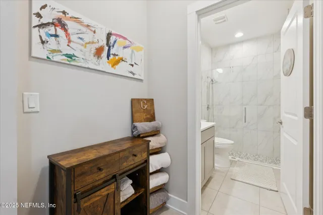 a bathroom with a picture of a shower curtain
