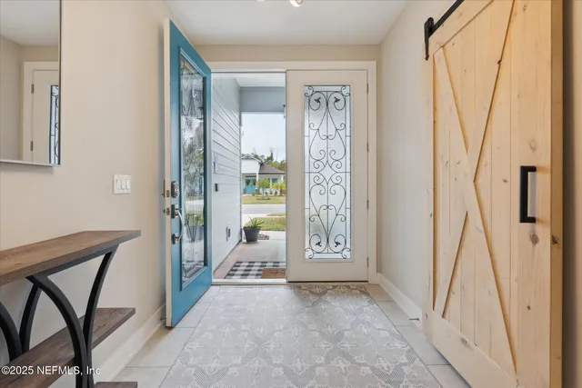 a view of an entryway with a livingroom