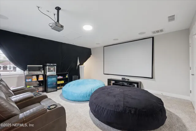 a bedroom with bed and window