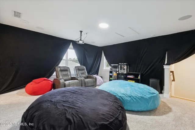 a bedroom with bed and window