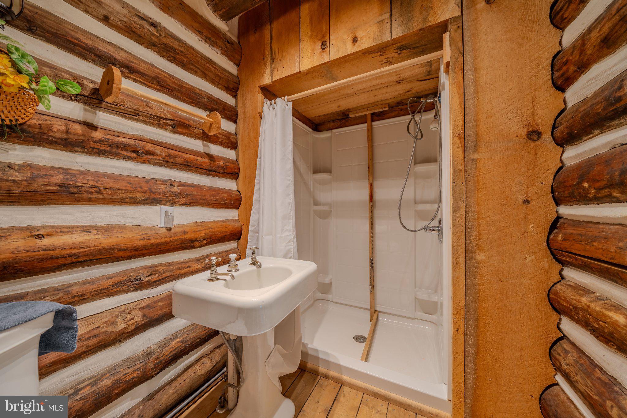 1520 Lingle Valley Road Milroy, PA 17063 - Photo 114 of 144 Rustic charm in a cozy bathroom.