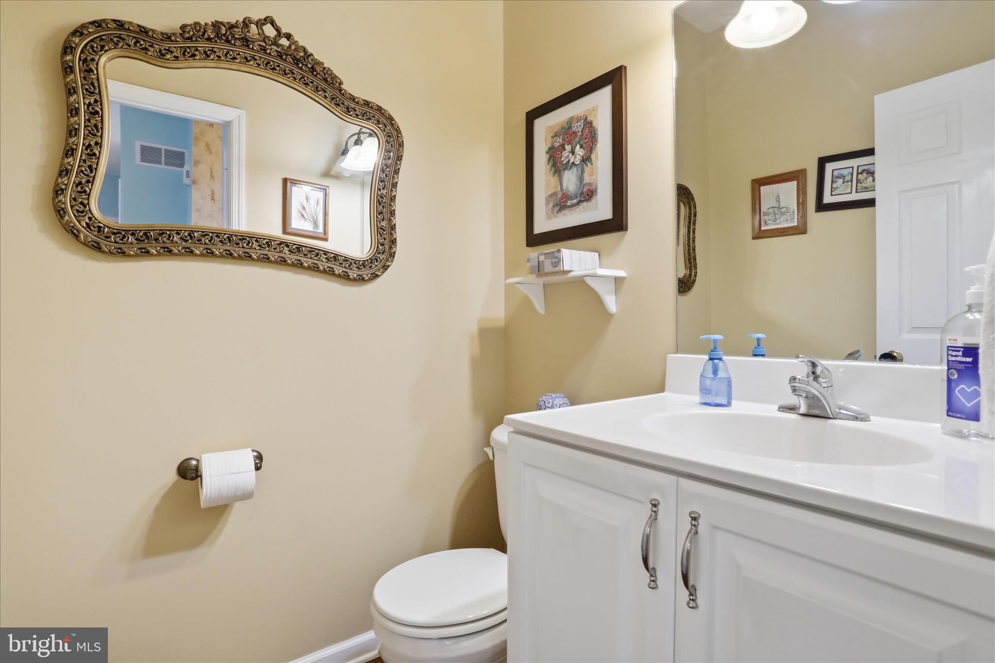 1175 North Lakewood Drive Ridgeley, WV 26753 - Photo 18 of 33 a bathroom with a toilet sink and mirror