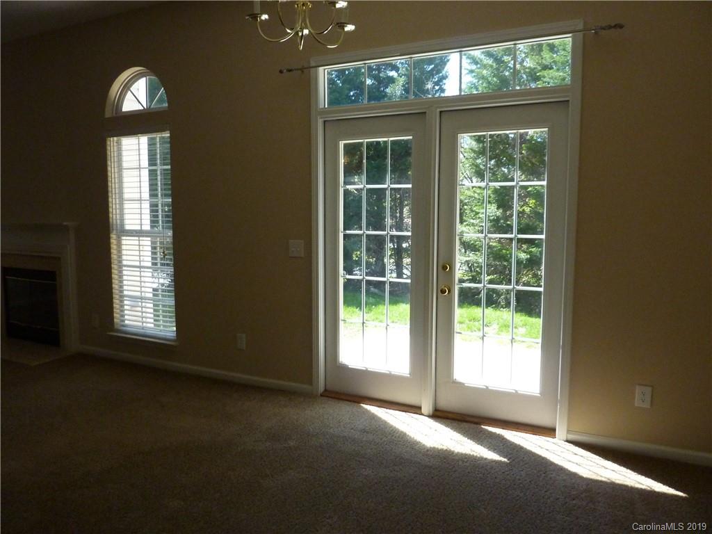 3607 Marbury Road Charlotte, NC 28269 - Photo 6 of 16 a view of empty room with large windows