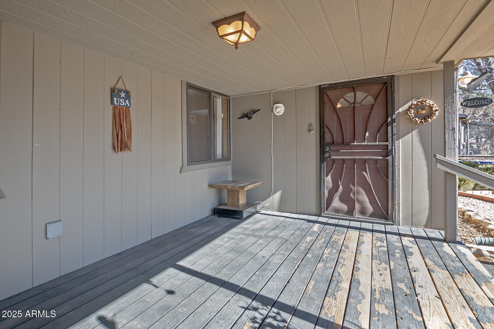 6066 S Road Pine, AZ 85544 - Photo 38 of 38 a view of empty room with wooden floor and fan
