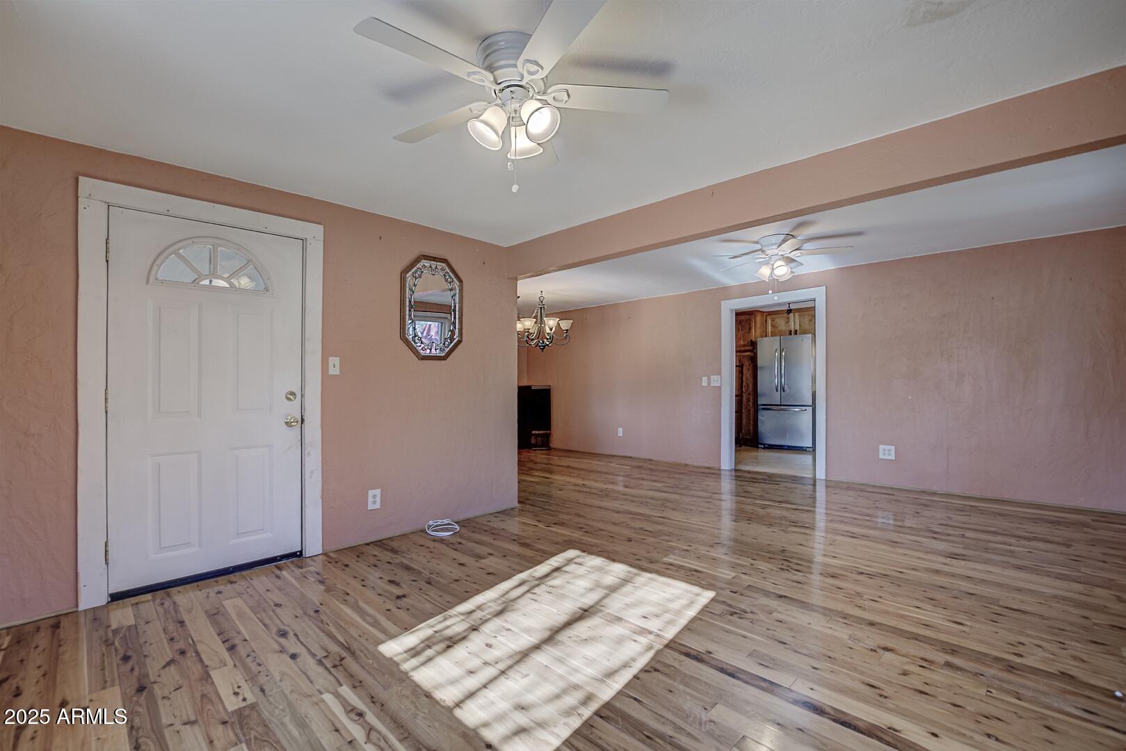 6066 S Road Pine, AZ 85544 - Photo 5 of 38 a view of a hallway with wooden floor