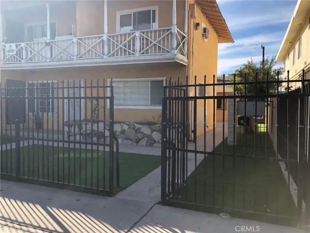 a view of a balcony with wooden floor