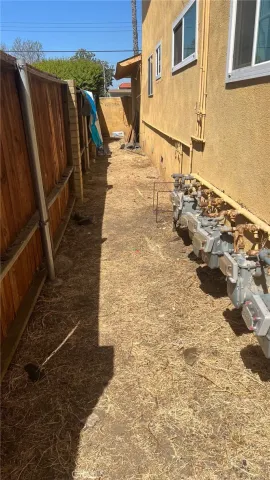 a view of a backyard of the house