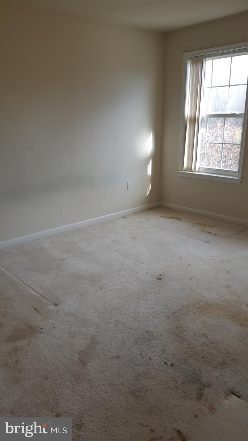 6990 Stuart Road King George, VA 22485 - Photo 8 of 15 an empty room with a window