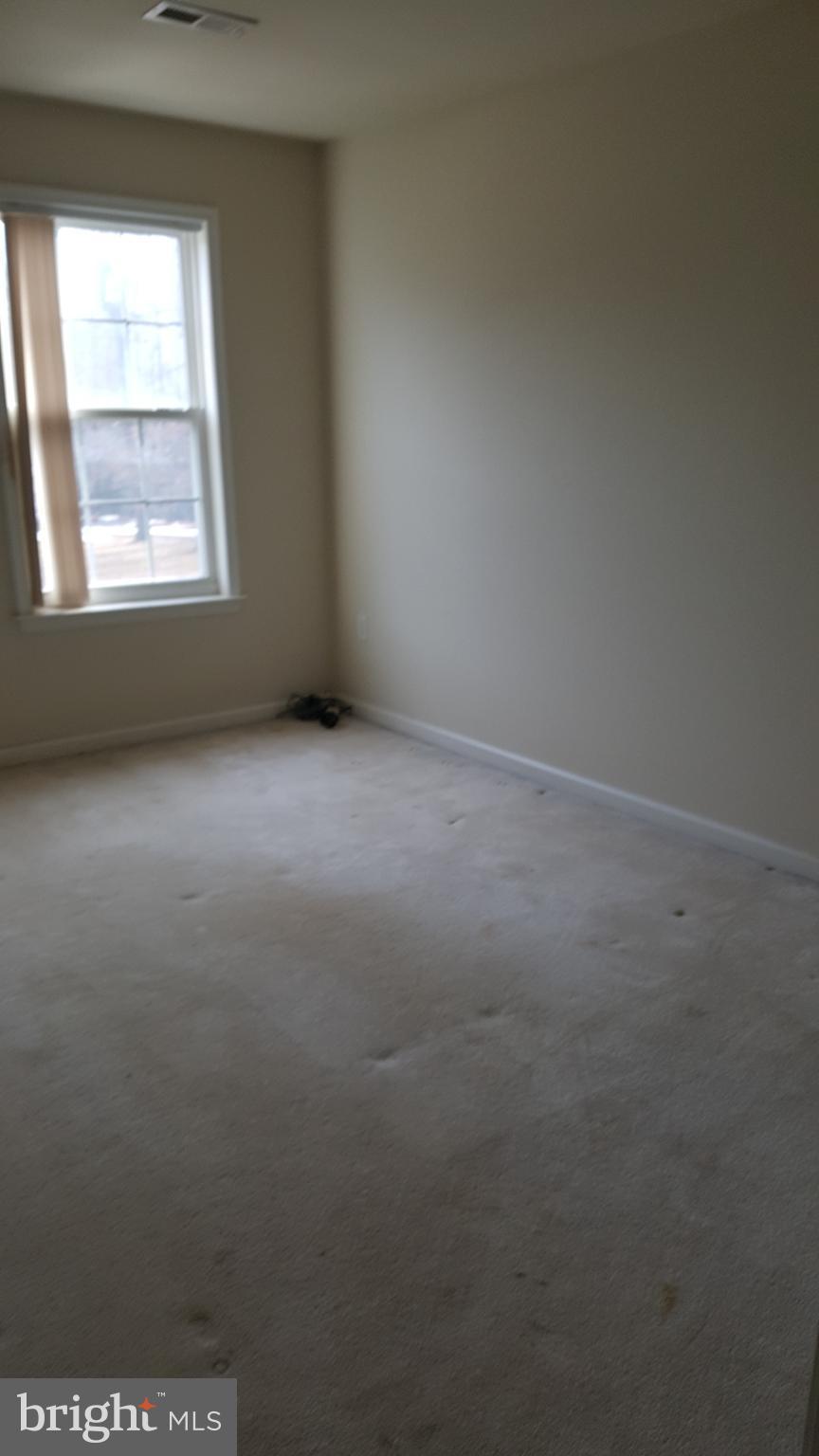 6990 Stuart Road King George, VA 22485 - Photo 9 of 15 an empty room with a window