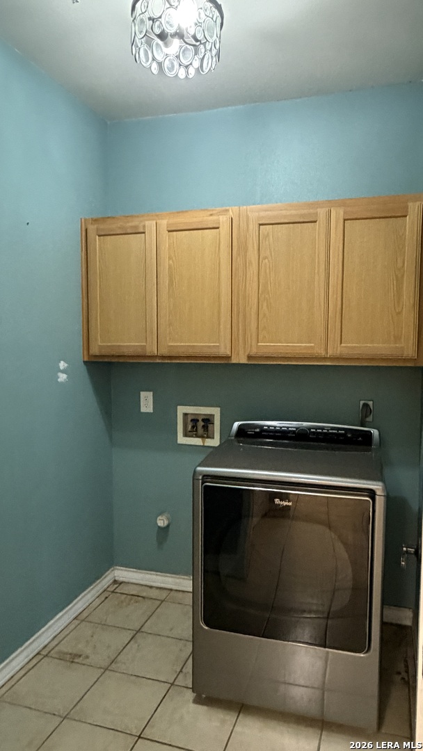 10565 Briggs Road Atascosa, TX 78002 - Photo 16 of 59 a kitchen with a stove and a microwave