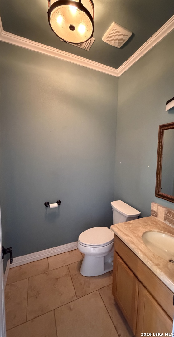 10565 Briggs Road Atascosa, TX 78002 - Photo 17 of 59 a bathroom with a sink and a toilet