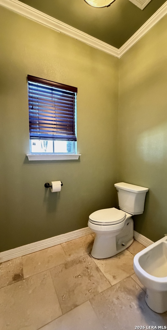 10565 Briggs Road Atascosa, TX 78002 - Photo 25 of 59 a bathroom with a toilet and a sink