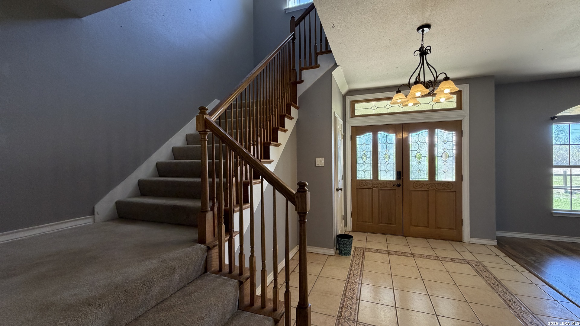 10565 Briggs Road Atascosa, TX 78002 - Photo 40 of 59 a view of entryway and hall with wooden floor