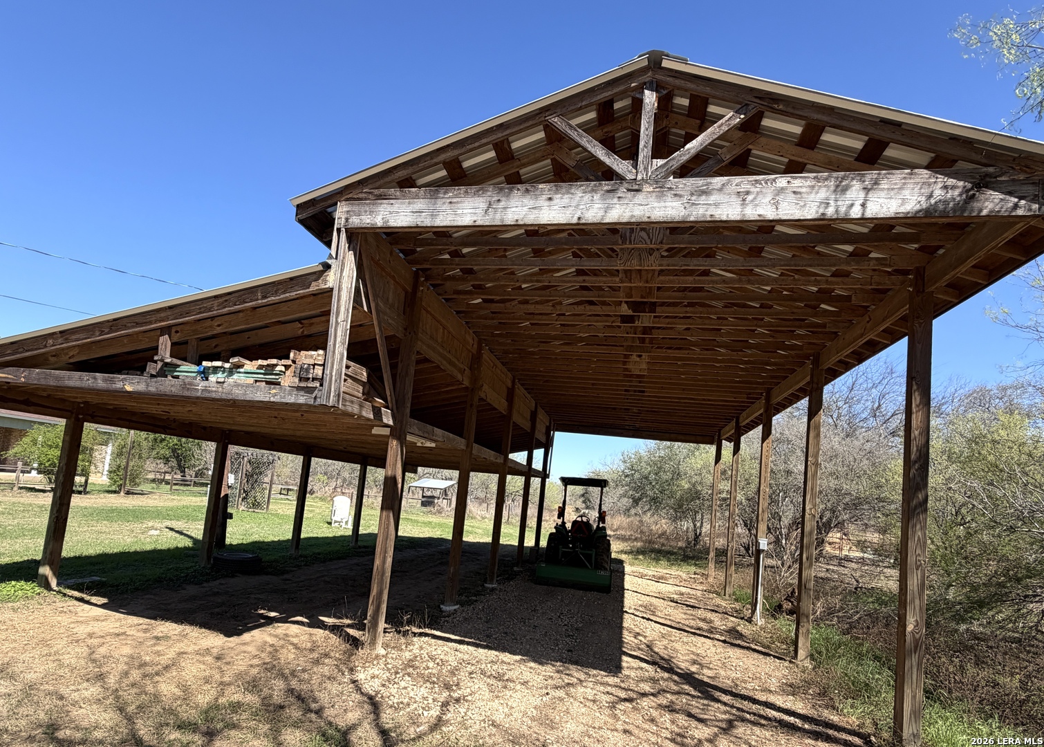 10565 Briggs Road Atascosa, TX 78002 - Photo 52 of 59 a front view of a house with garden