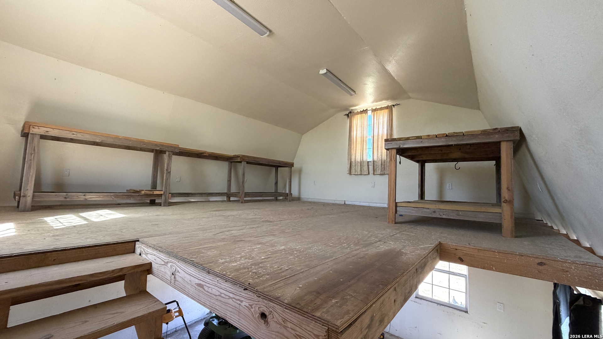 10565 Briggs Road Atascosa, TX 78002 - Photo 56 of 59 a living room with a fireplace
