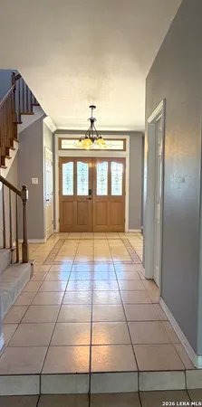 a kitchen with stainless steel appliances granite countertop a stove and a refrigerator
