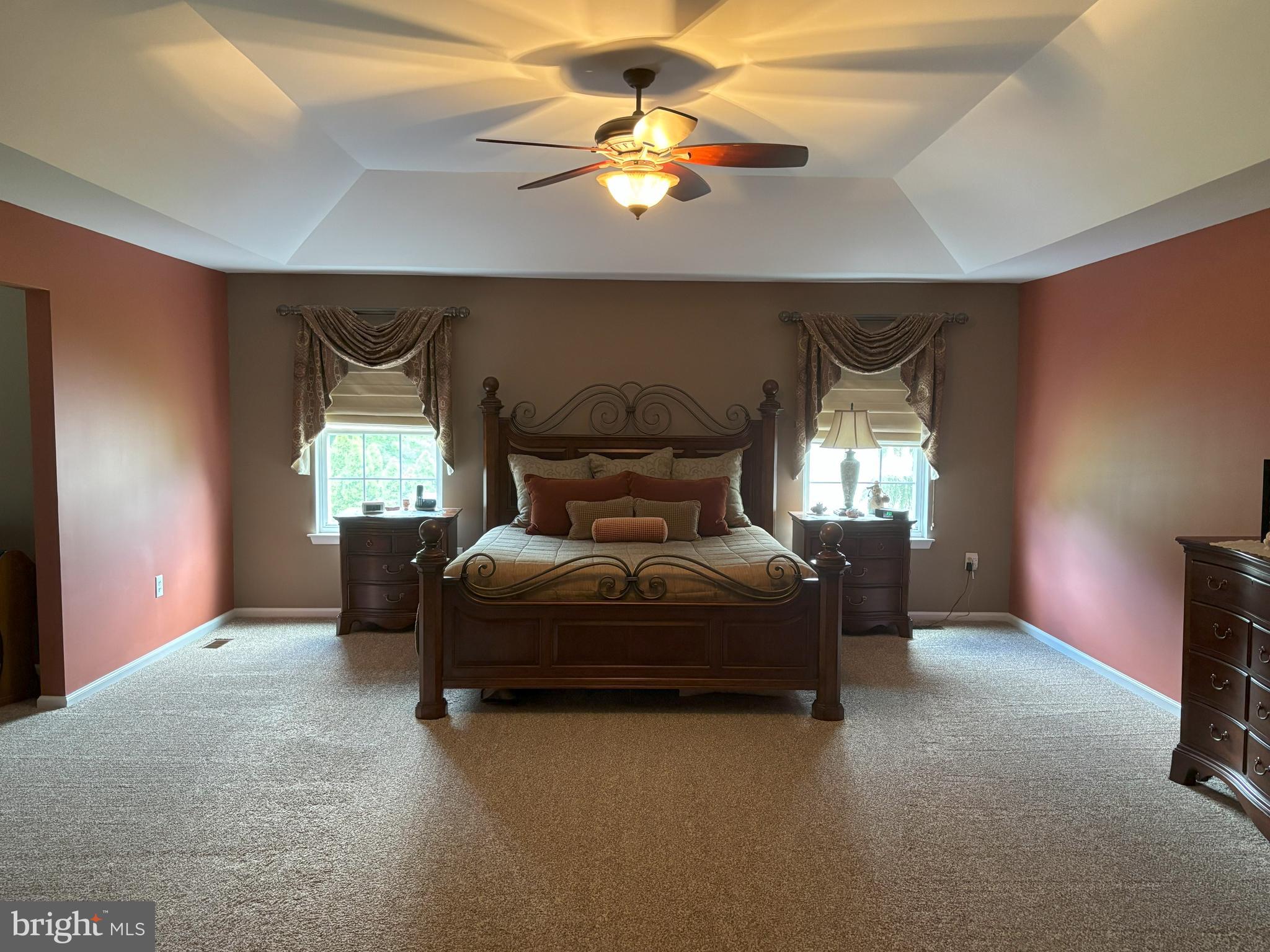 916 Nottingham Road Pottstown, PA 19465 - Photo 21 of 48 a bedroom with a bed and a chandelier