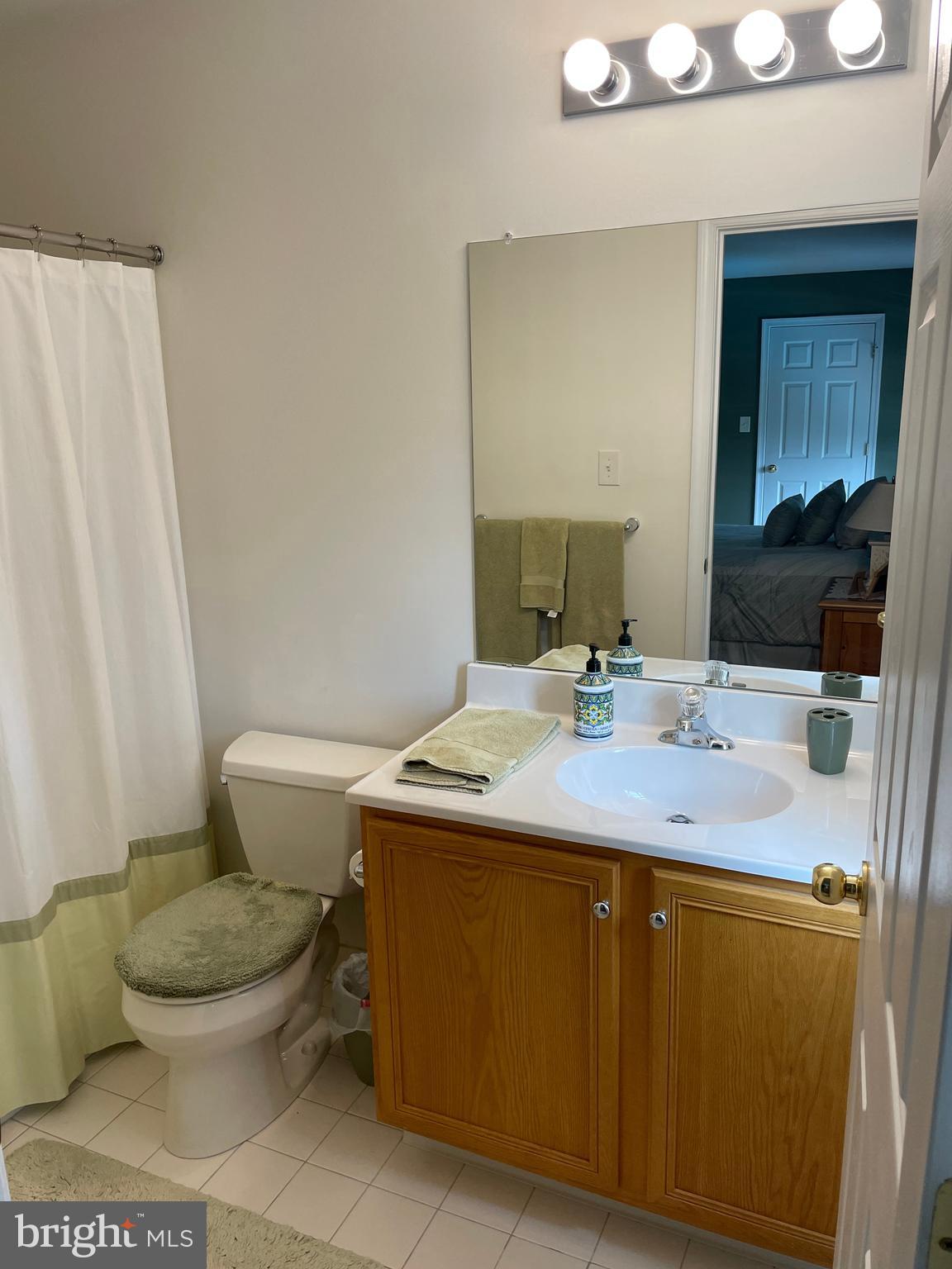 916 Nottingham Road Pottstown, PA 19465 - Photo 31 of 48 a bathroom with a granite countertop toilet sink and mirror