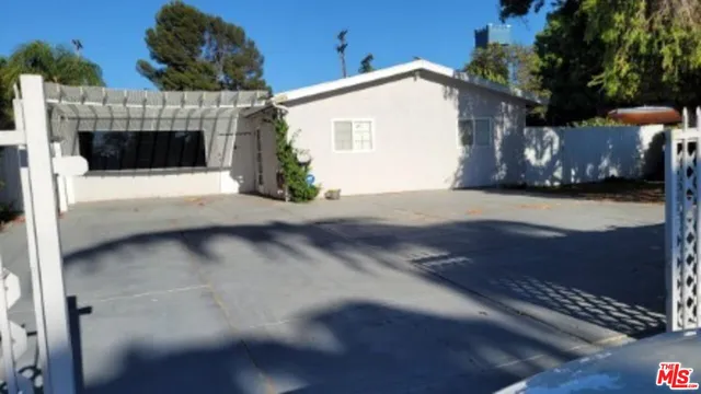 a front view of a house with a garage