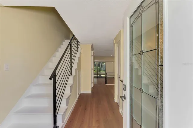 a kitchen with a sink and a refrigerator
