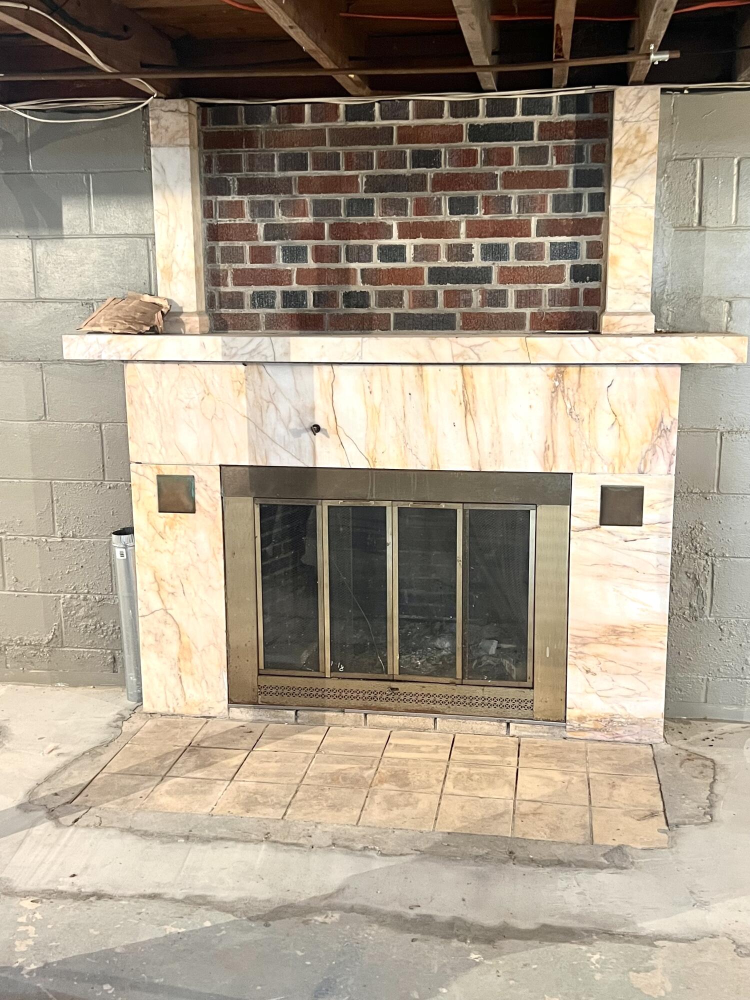5909 Defield Road Coloma, MI 49038 - Photo 23 of 34 Basement Fireplace
