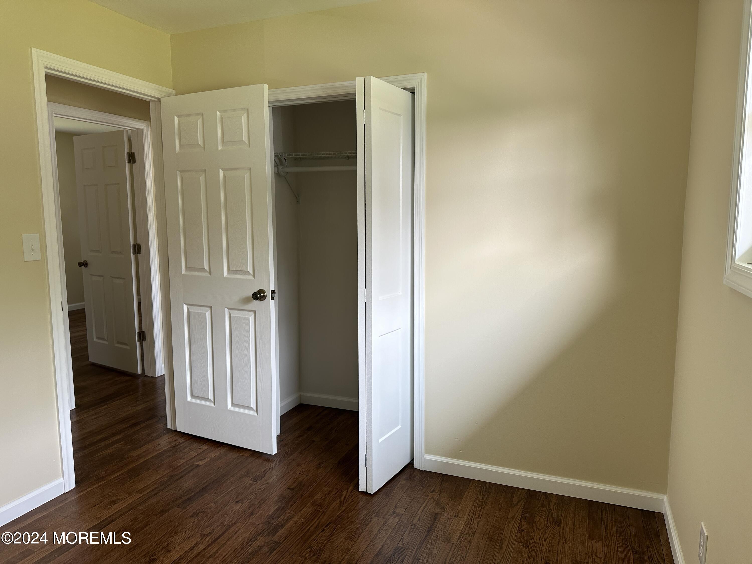 21 Middlesex Road Matawan, NJ 07747 - Photo 14 of 19 a view of empty room with wooden floor