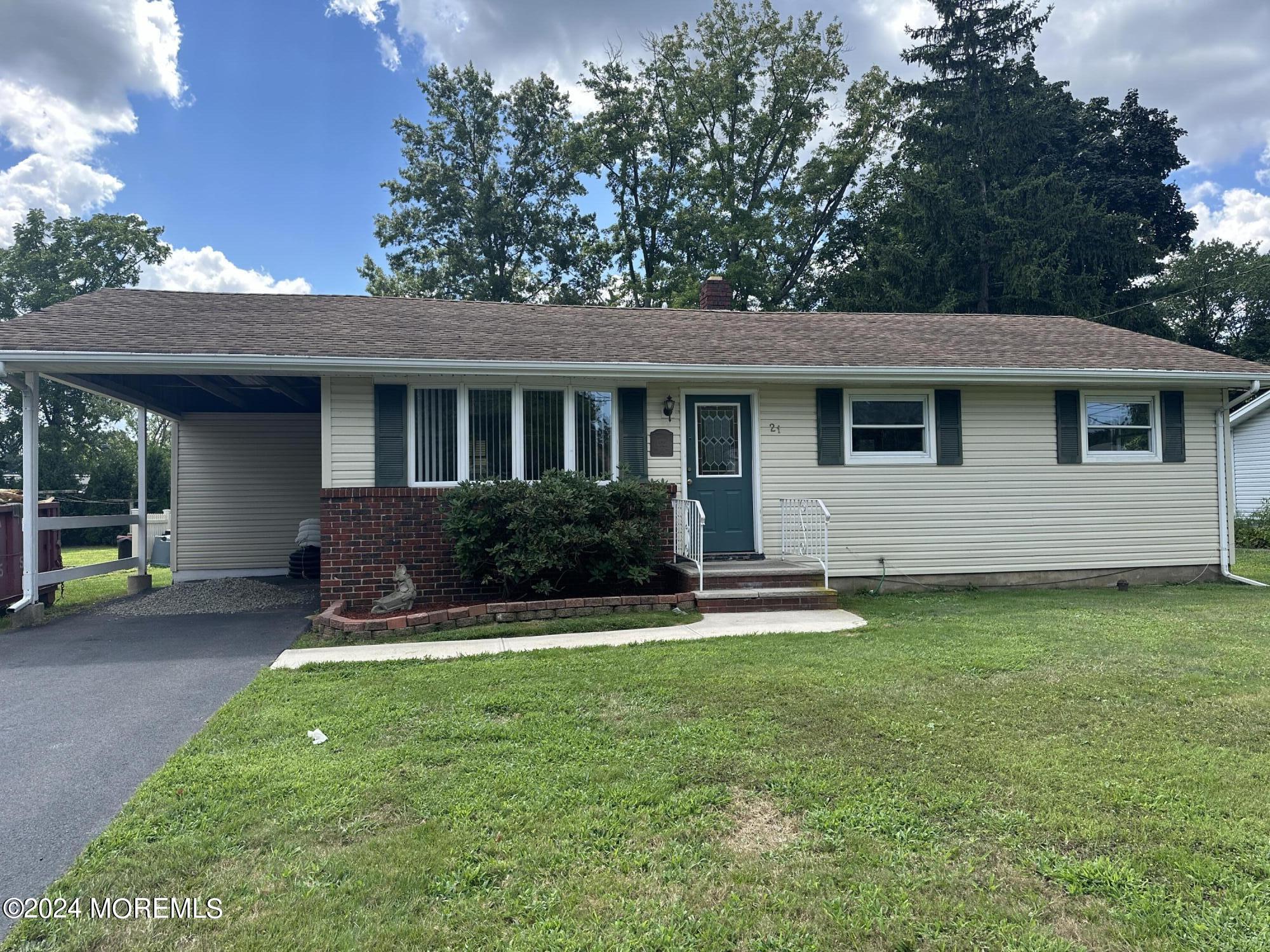 21 Middlesex Road Matawan, NJ 07747 - Photo 2 of 19 a view of a house with a yard and sitting area