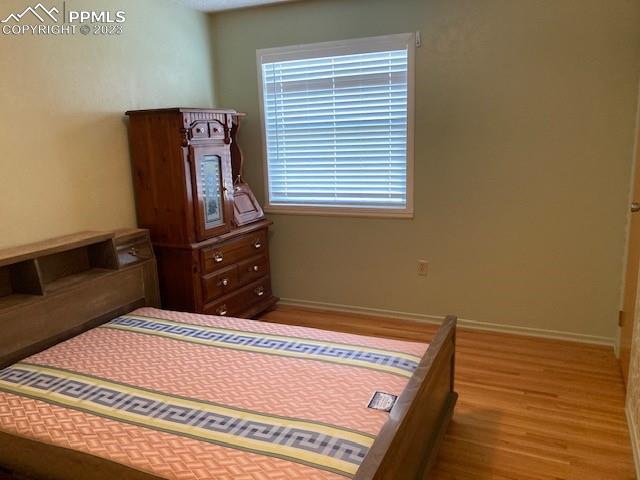 355 North Rush Road Rush, CO 80833 - Photo 14 of 41 a bed sitting in a bedroom next to a window