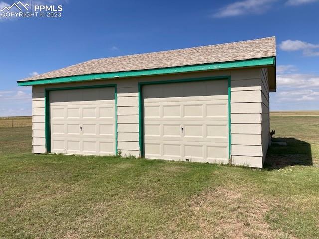 355 North Rush Road Rush, CO 80833 - Photo 17 of 41 a view of a house with a yard