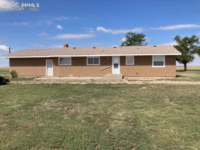 355 North Rush Road Rush, CO 80833 - Photo 2 of 41 a front view of a house with a yard
