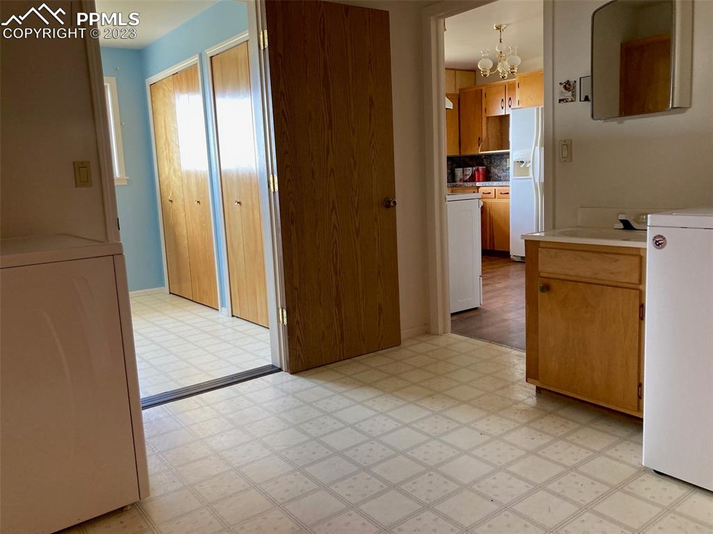 355 North Rush Road Rush, CO 80833 - Photo 26 of 41 a view of a kitchen from the hallway