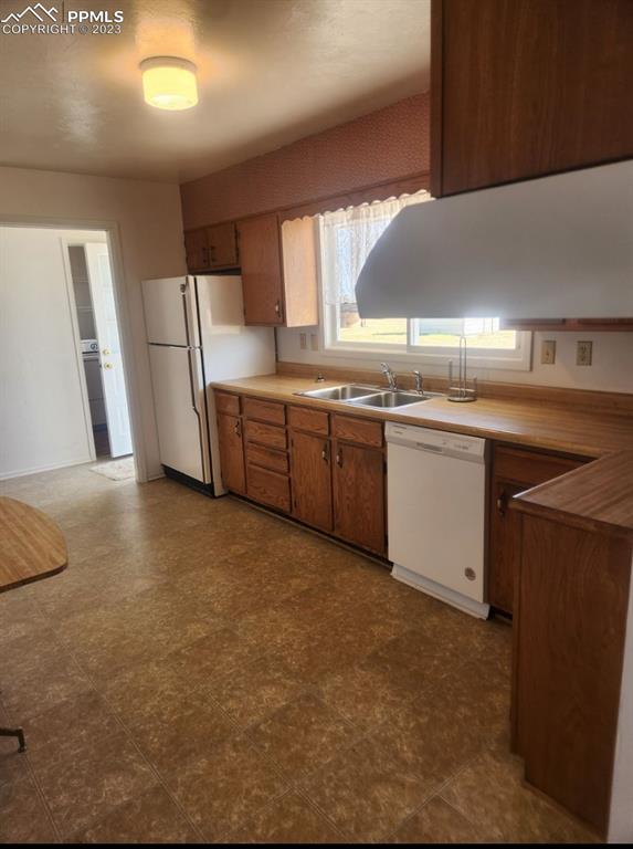 355 North Rush Road Rush, CO 80833 - Photo 5 of 41 a kitchen with lots of counter top space and appliances