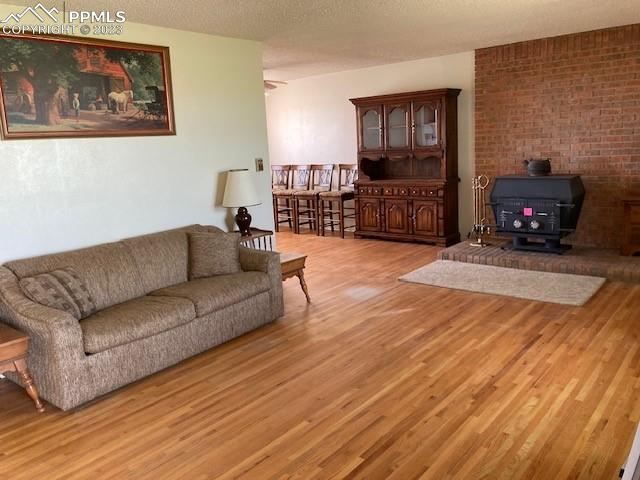355 North Rush Road Rush, CO 80833 - Photo 7 of 41 a living room with furniture and a wooden floor
