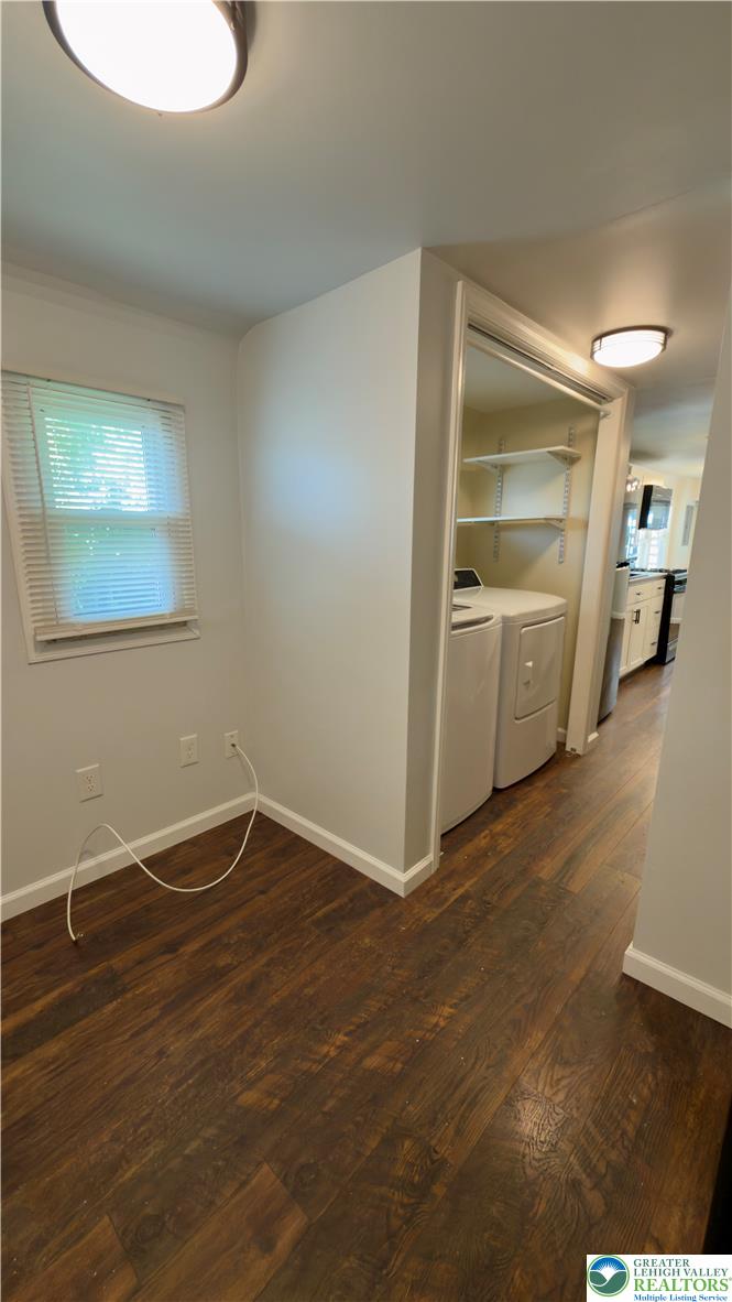 246 Poplar Street Bath, PA 18014 - Photo 27 of 34 Functional laundry nook with shelving and easy-care laminate wood flooring.