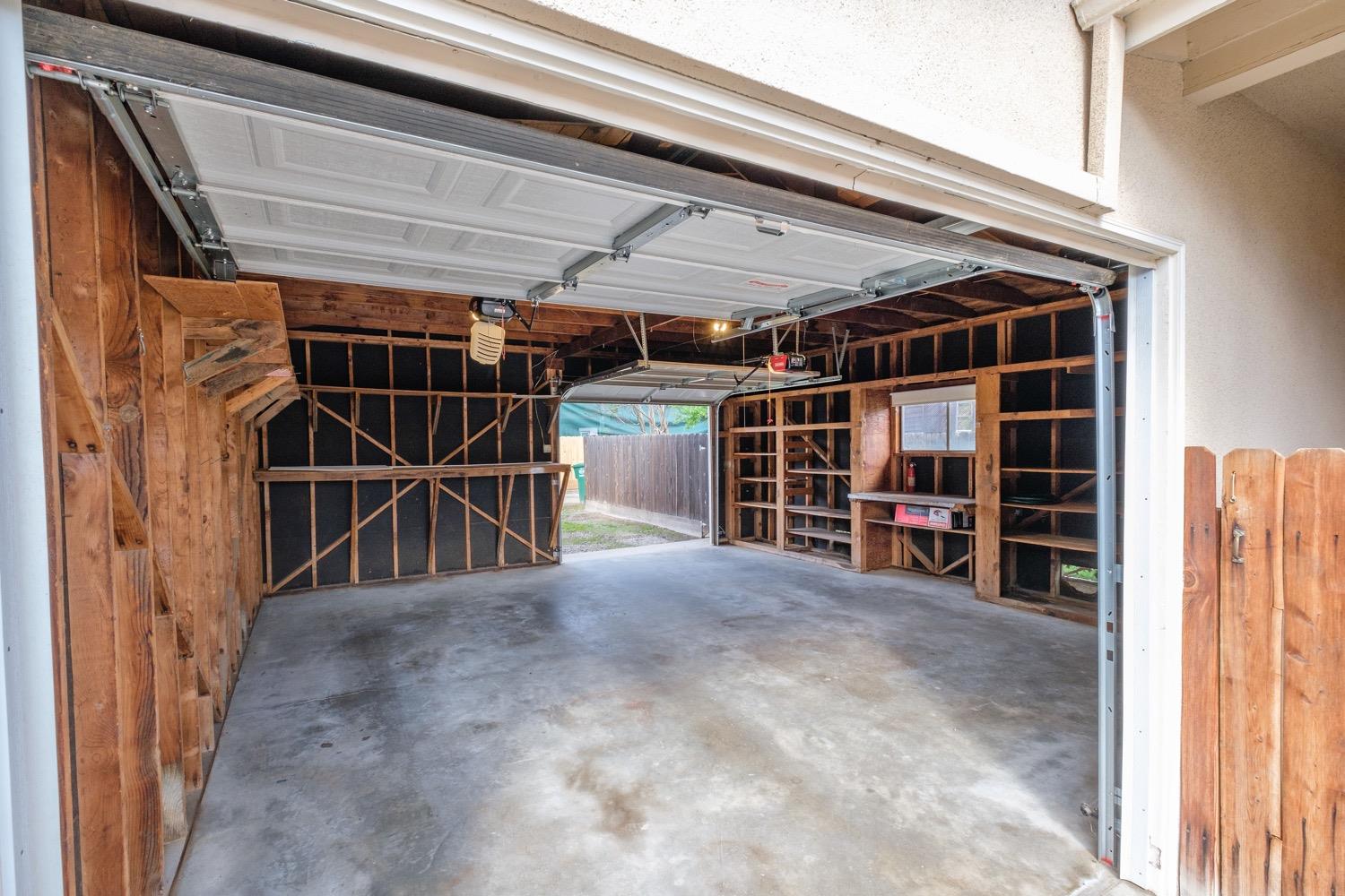 1223 Cyrier Avenue Reedley, CA 93654 - Photo 16 of 21 a view of empty room with shelves