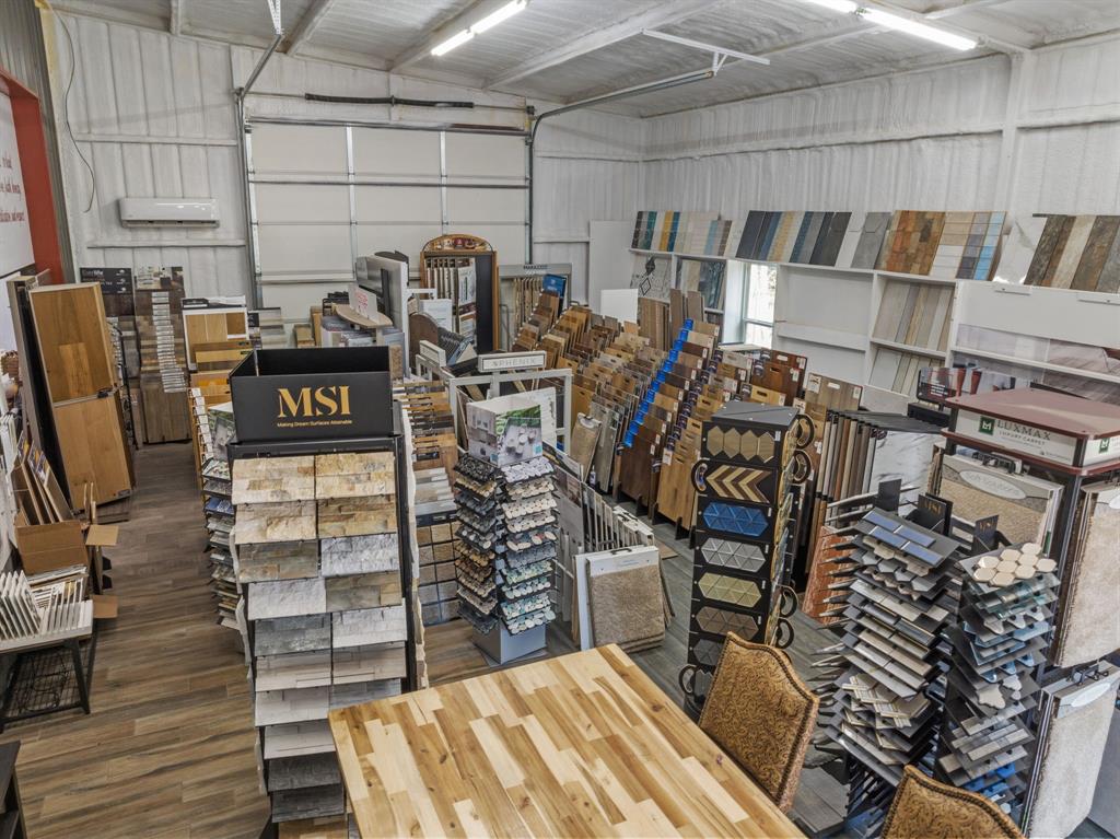 5058 West Highway 199 Springtown, TX 76082 - Photo 36 of 40 a view of walk in closet with clothes