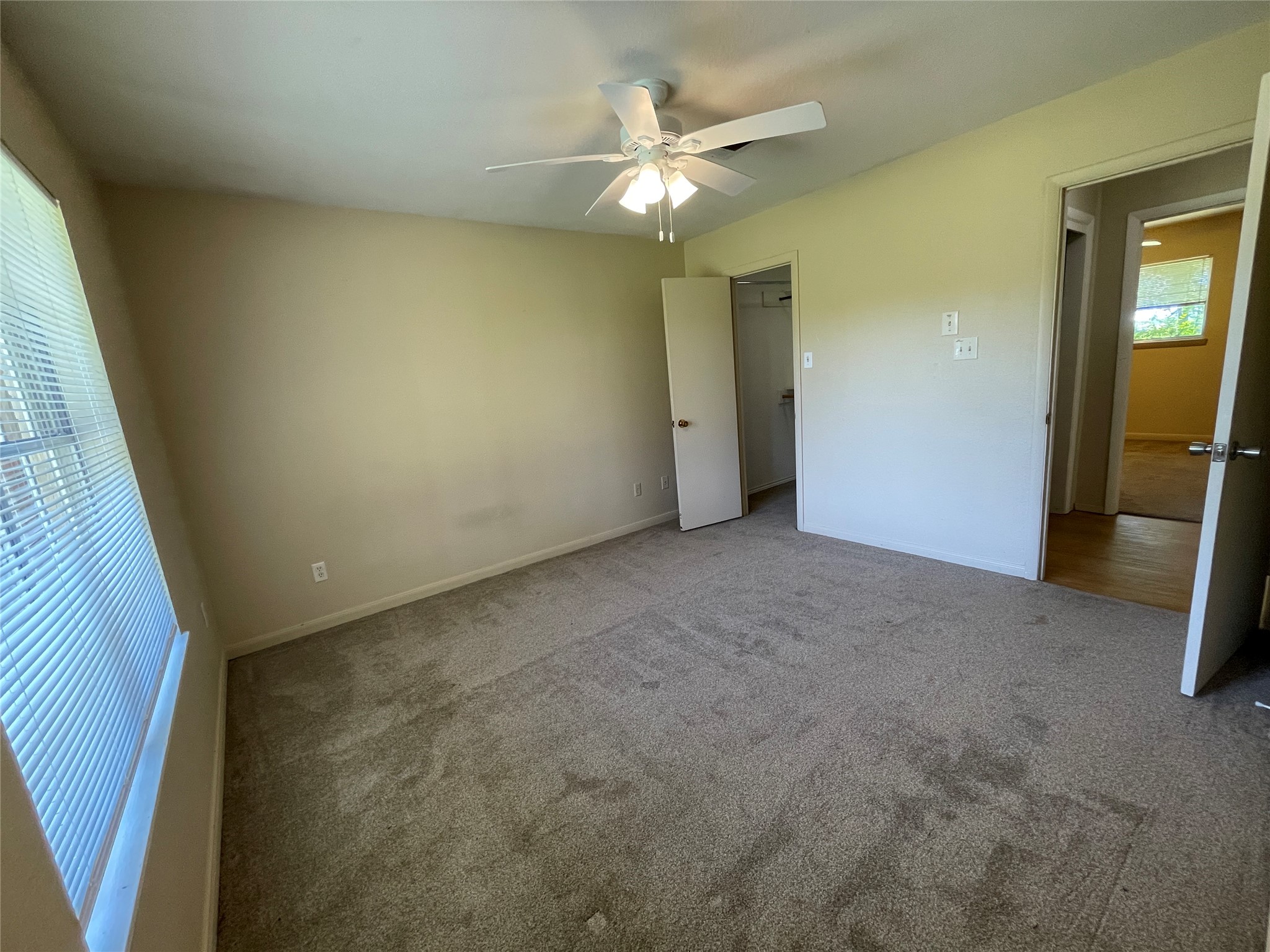 19439 Keenan Cut Off Road Montgomery, TX 77316 - Photo 29 of 39 Back bedroom offers the perfect retreat with its spacious walk-in closet, ready to accommodate your lifestyle.