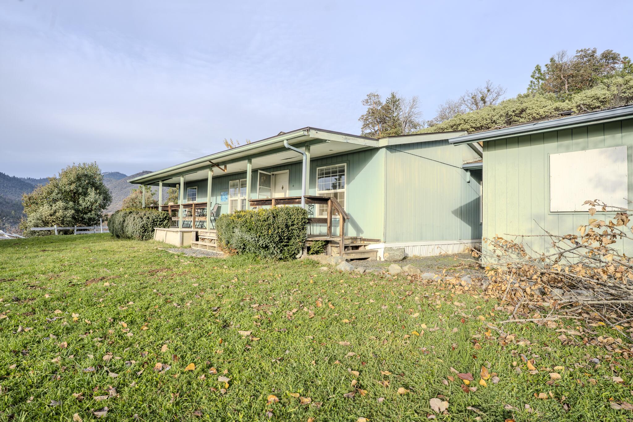 362 Humbug Creek Road Jacksonville, OR 97530 - Photo 18 of 49 a view of a house with a backyard
