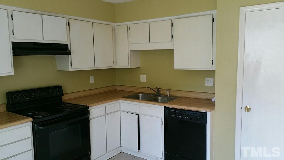 322 Junction Road, Unit 36A Durham, NC 27703 - Photo 4 of 10 a kitchen with a sink and cabinets