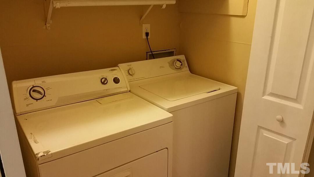 322 Junction Road, Unit 36A Durham, NC 27703 - Photo 8 of 10 a utility room with dryer and washer